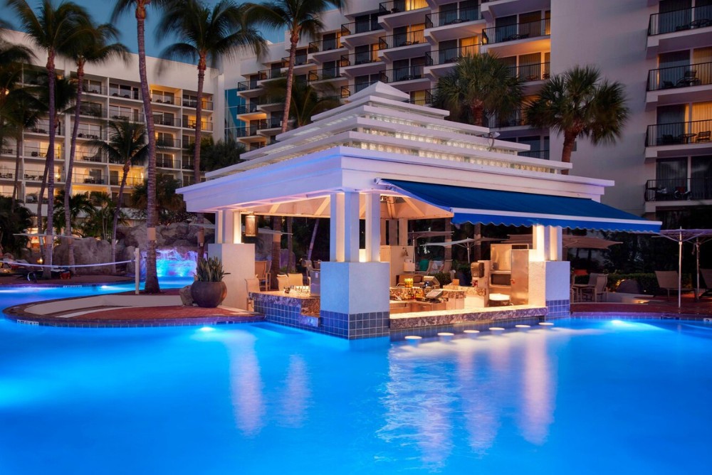 Poolside beach bar at dusk